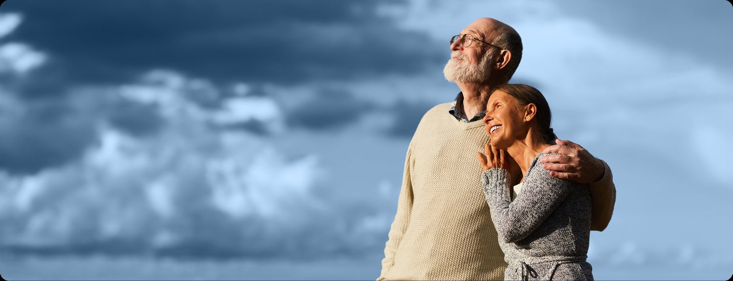 Active senior couple by the sea