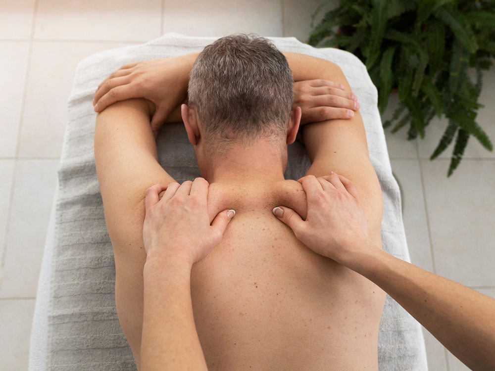 Massage therapy easing back and neck tension at Humble Chiropractic Fort Myers